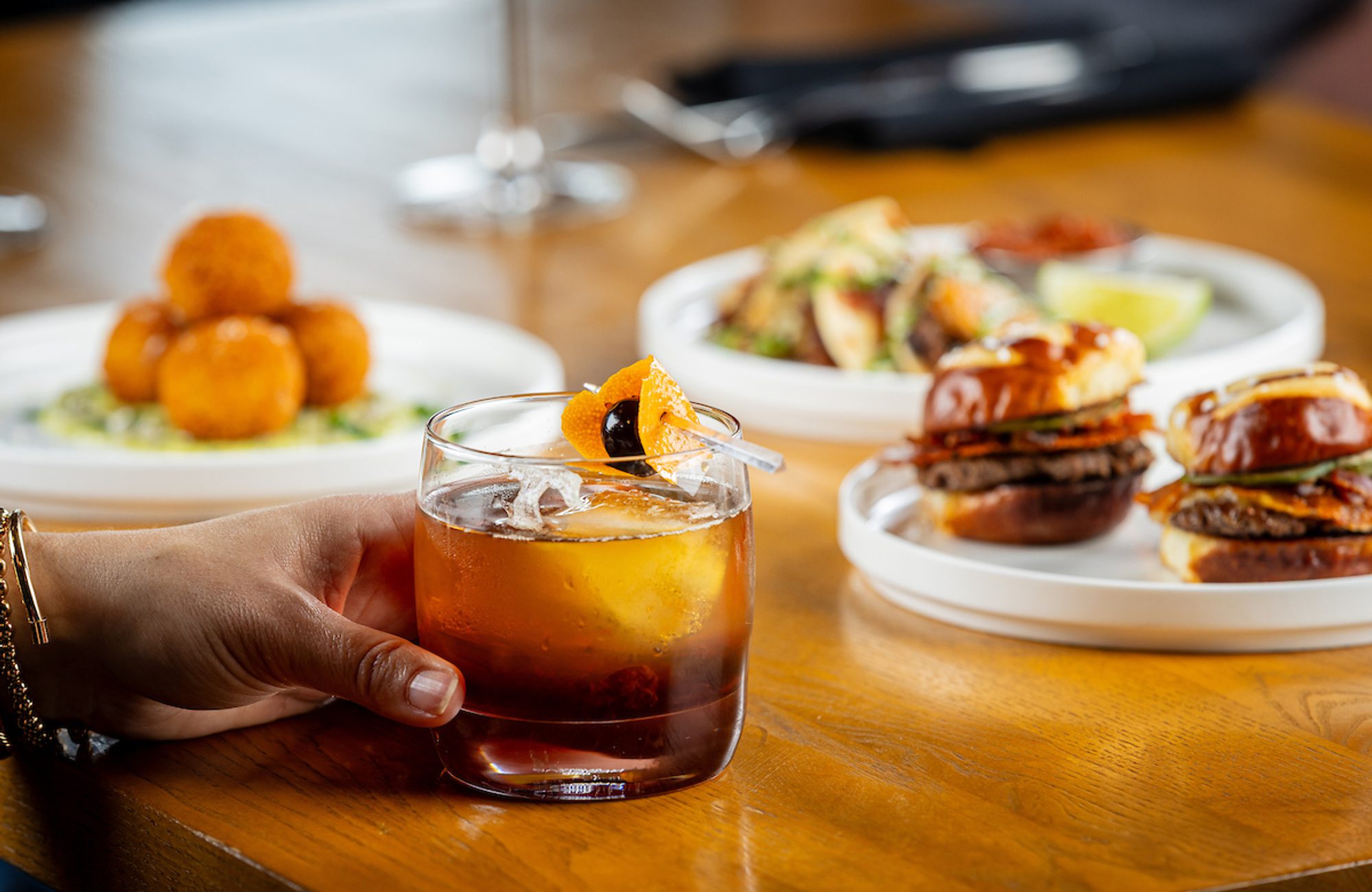 Happy Hour Image with Food and Cocktails