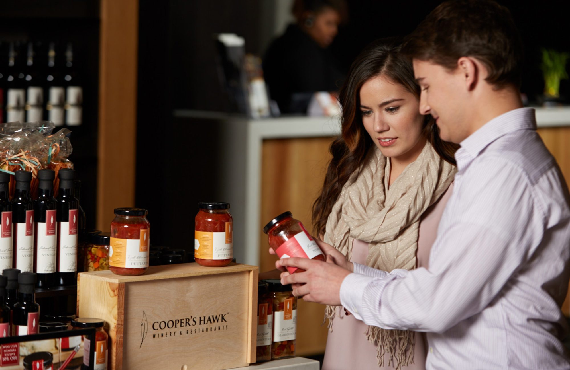 A woman wearing a white shirt.