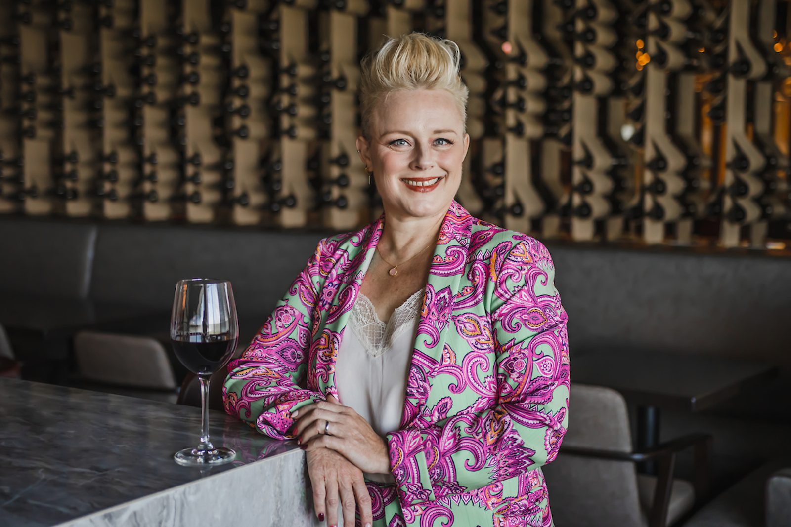 A woman smiling at the camera.