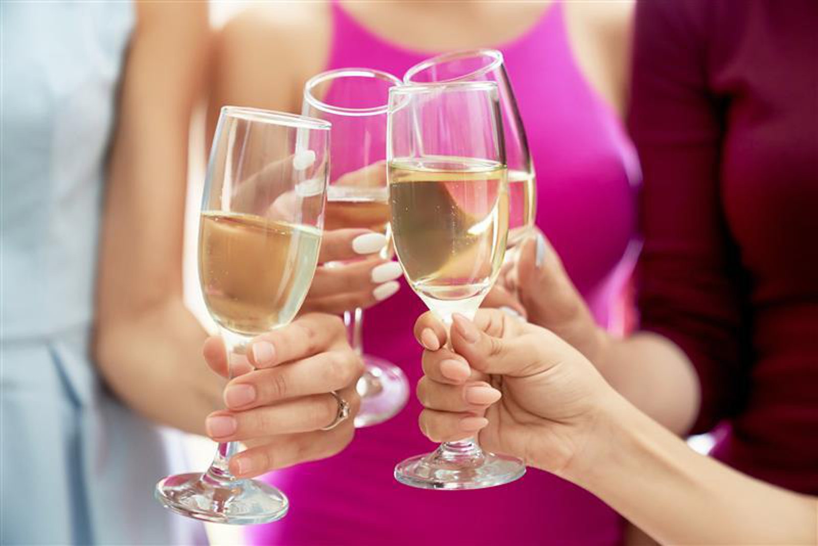 Feb 2025 WC Dinner image with a cheers of champagne glasses