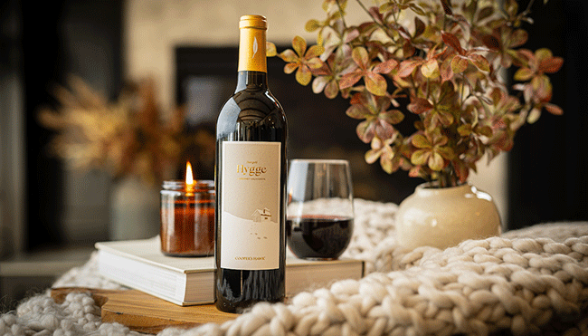 Hygge Wine Bottle Image with cozy background