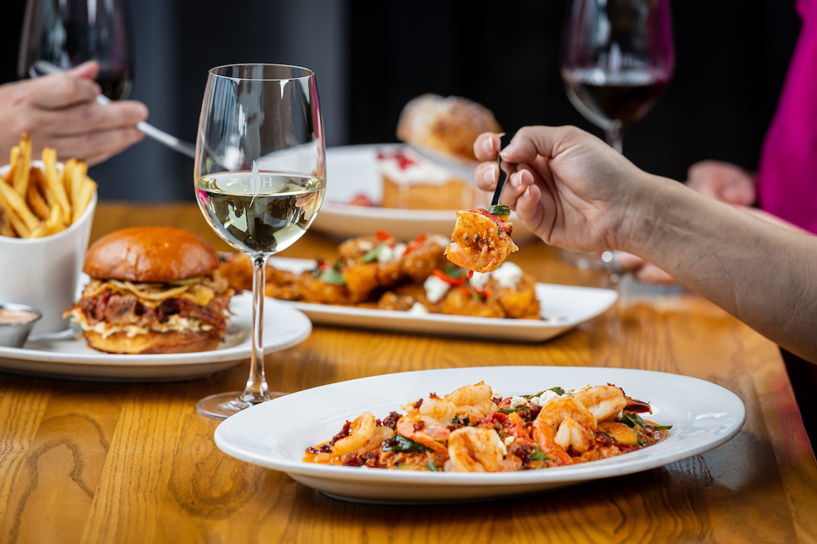 Image of Food and glass of wine at the table