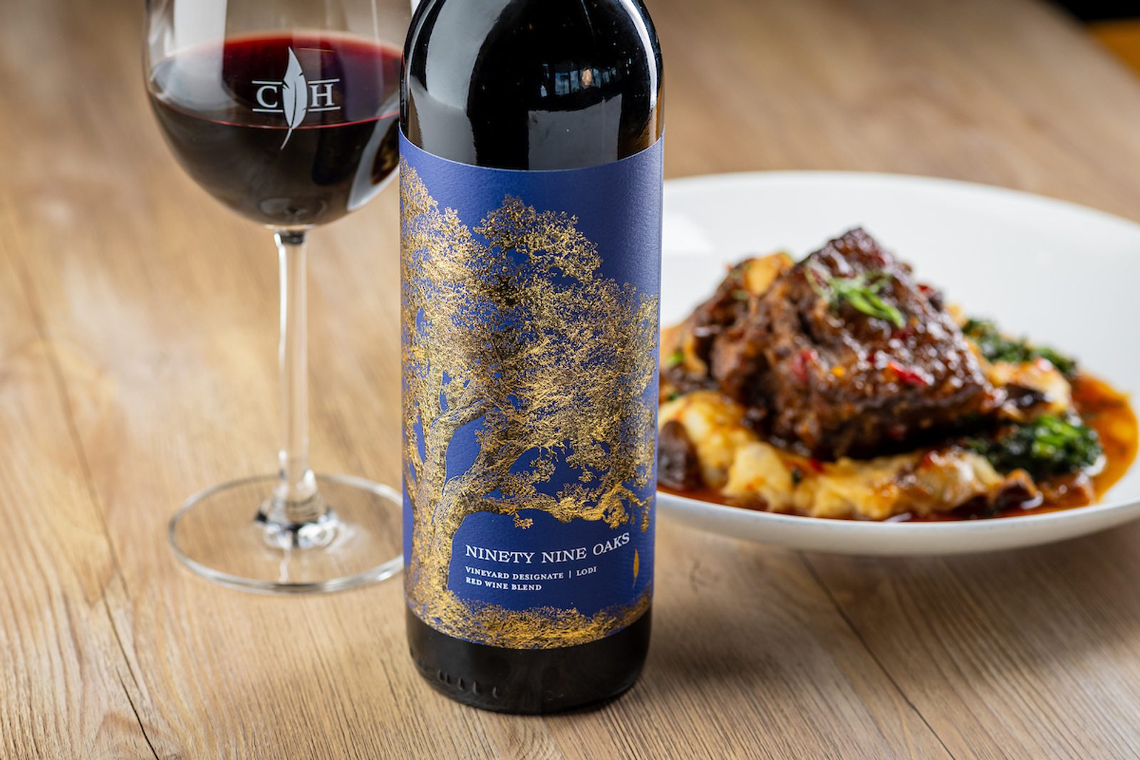 Shanghai Braised Short Ribs & 99 Oaks Image at the table