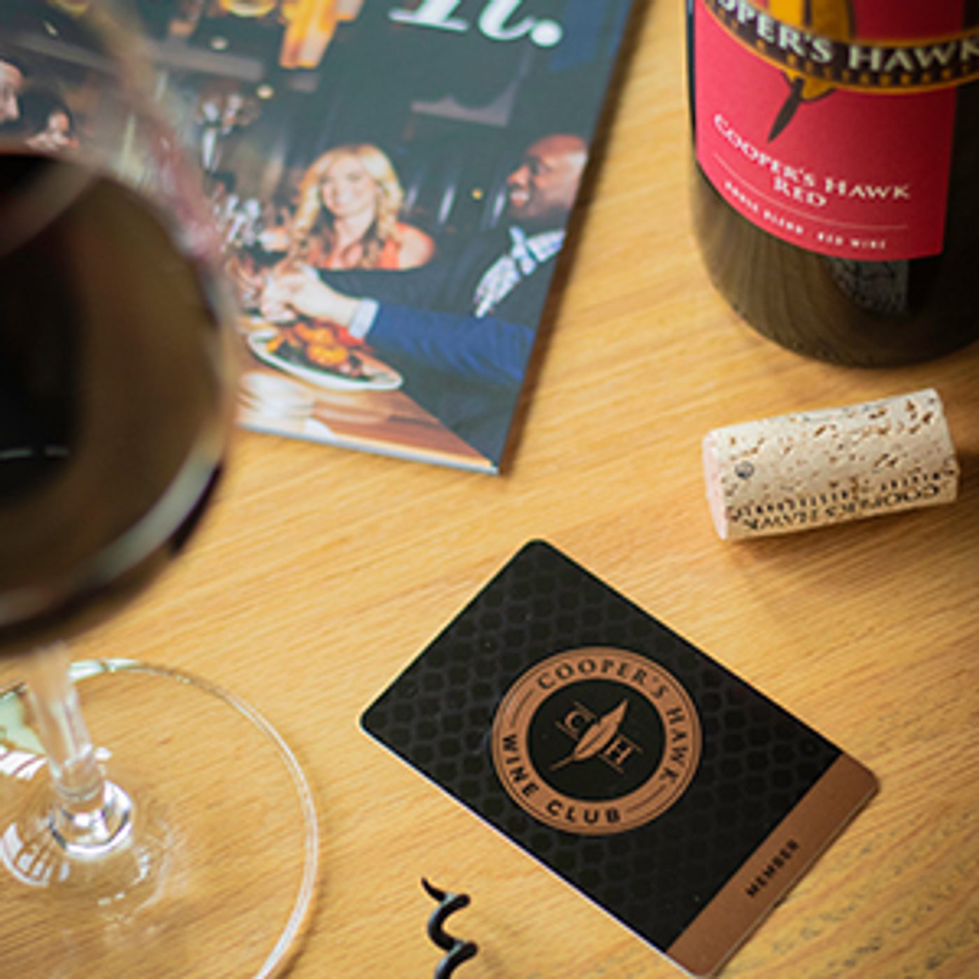 A bottle of wine on a table.