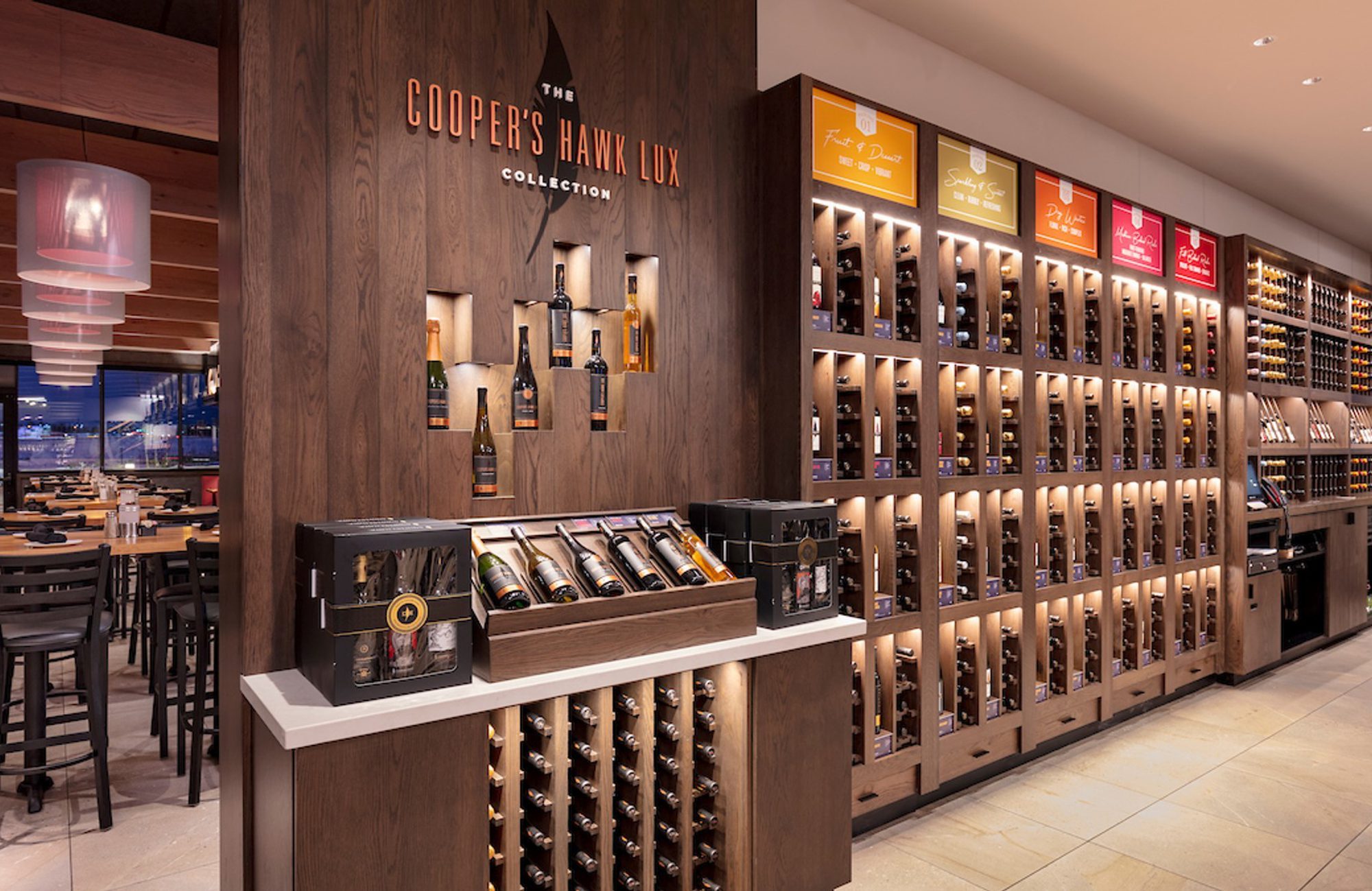 A wine bar with a lot of wine bottles.