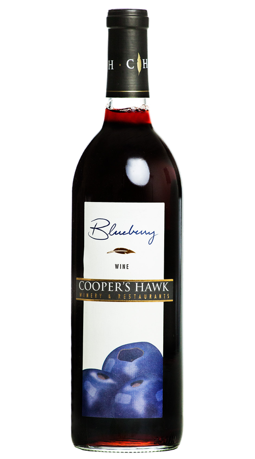 A bottle of blueberry wine on a white background.